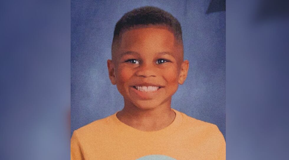 An autopsy showed that Troy Khoeler, 7, had suffered both new and old injuries before his death.
